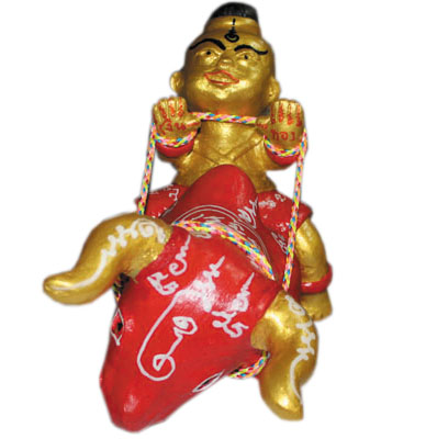 Kumanthong sitting on Buffalo - Ajahn Authen